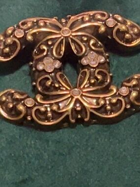 silver tone Filigree CC Logo Brooch with silver Accents